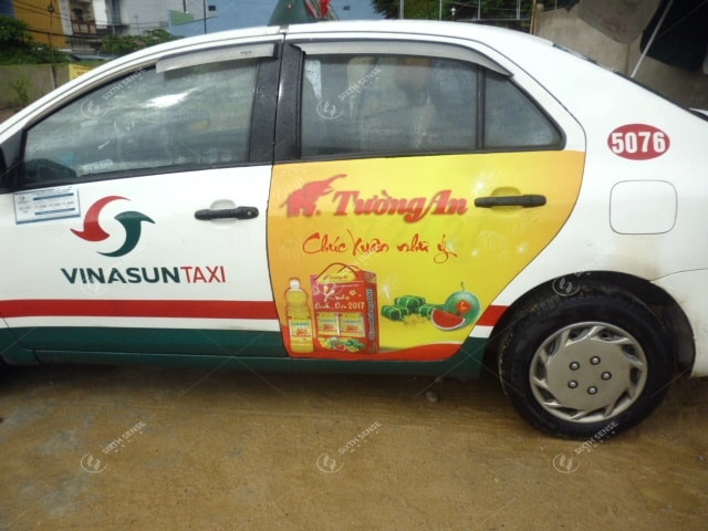 Dầu ăn Tường An - Quảng cáo trên cửa xe taxi Vinasun tại TPHCM